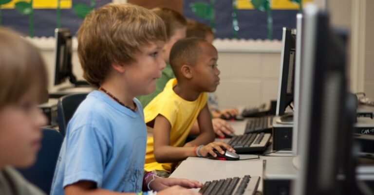 Students on computers (public domain image)